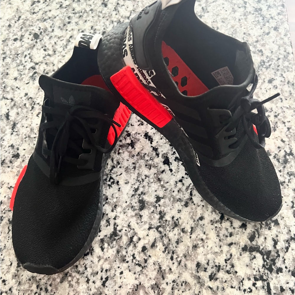 Size 7 boys NMD like new only worn maybe twice . Come with box